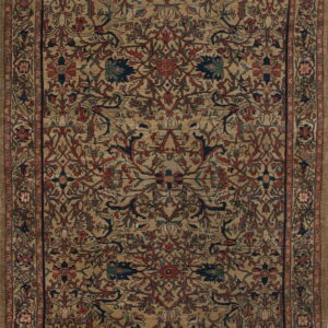 Low-pile rug with a dense traditional floral pattern in deep red and navy blue on a muted beige field.