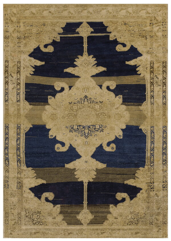 Tan and navy patterned rug featuring a stylized central medallion over horizontal striped color blocks.
