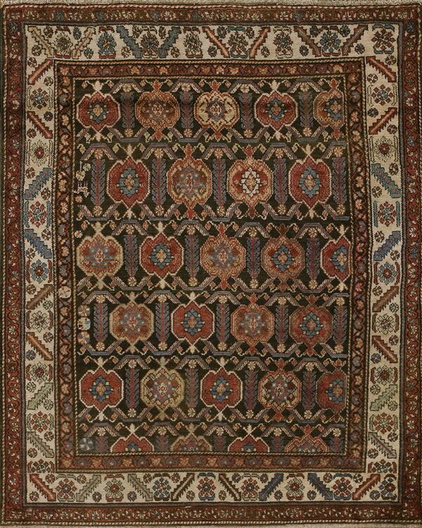 Traditional rug with a dark field, repeating red, blue, and beige medallions, and light patterned borders.