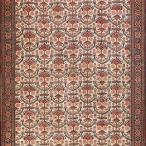 Cream rug featuring repeating terracotta, blue, and brown stylized plant and bird motifs with a multi-layered border.