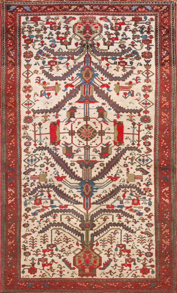 Low-pile rug featuring a complex symmetrical tribal design in red, blue, and brown on an ivory background.