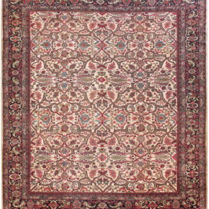 Cream field rug with an intricate repeating pattern of red, green, and blue florals and a dark border.