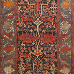 Detailed tribal-style rug featuring a dark navy field with complex red, yellow, and blue geometric and stylized patterns.