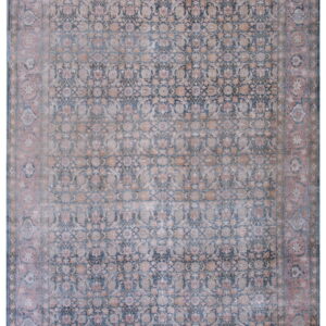 Ornate traditional rug with a detailed field pattern in faded dark blue and beige, framed by a wide pink border.