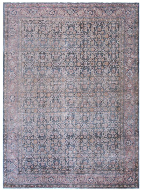 Ornate traditional rug with a detailed field pattern in faded dark blue and beige, framed by a wide pink border.