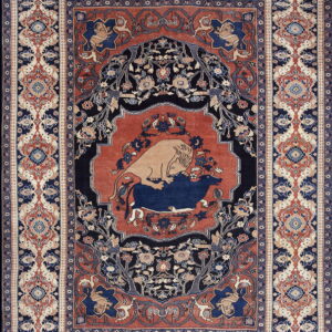 A detailed traditional rug features a central medallion with a lion fighting a bull, surrounded by navy and terracotta borders.