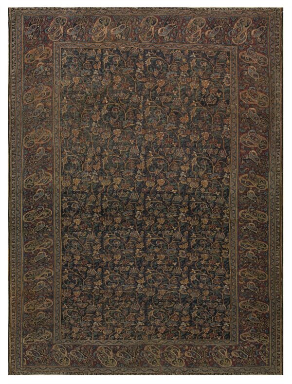 Dark navy rug with intricate all-over floral pattern and a wide reddish-burgundy paisley border.