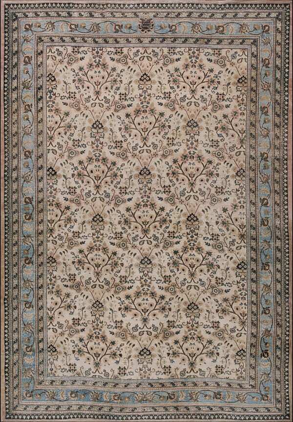 Beige traditional rug with a repeating muted floral vine pattern and a wide dusty blue border design.