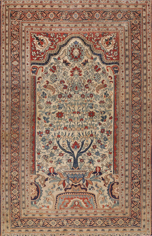 Traditional rug in beige, red, and blue featuring a detailed floral tree-of-life motif within an arched frame.