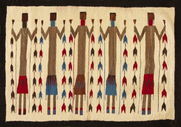 Low-pile rug featuring repeating brown stylized figures separated by vertical strings of red and blue arrows.