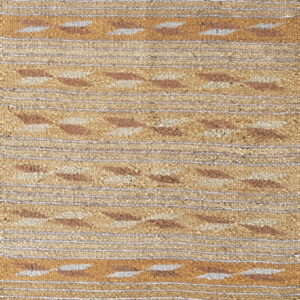 Textured striped rug in tan and gold with brown and gray geometric diamond patterns.