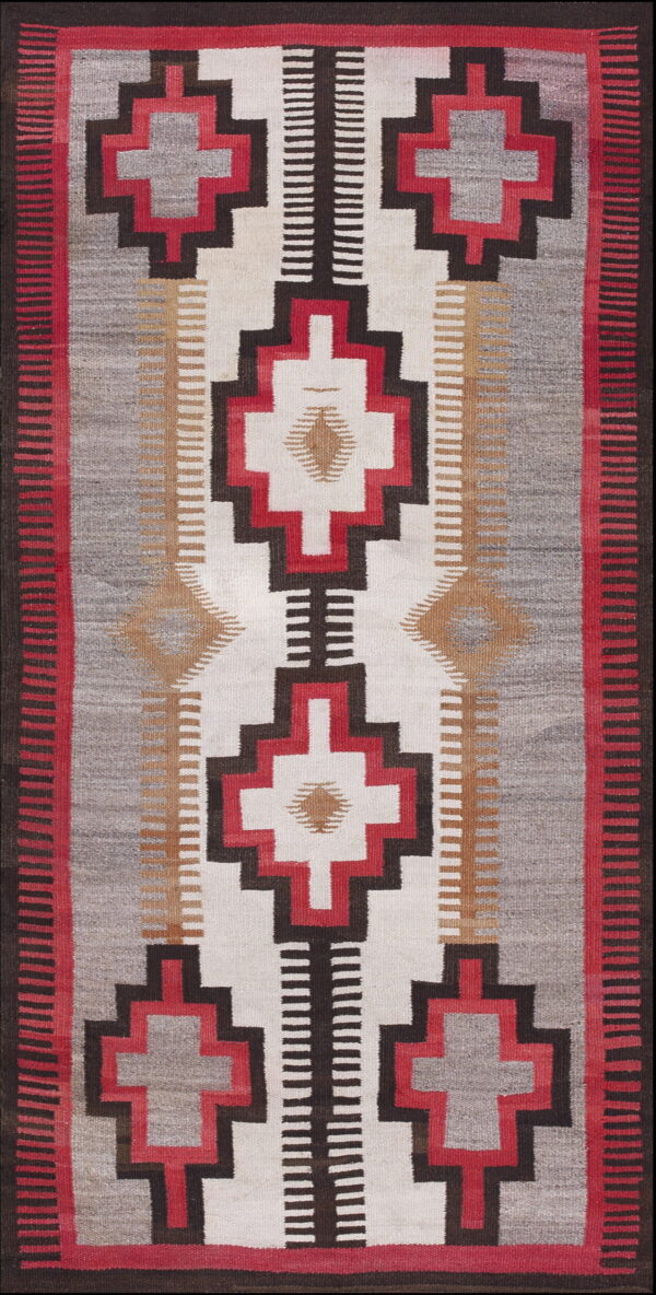Flatweave runner rug featuring strong geometric patterns in red, gray, black, and white.
