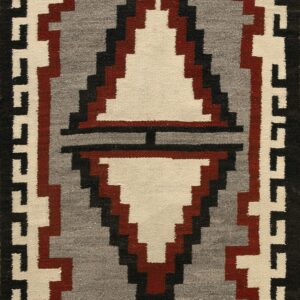Flatwoven rug featuring a central stepped diamond in cream, gray, black, and reddish-brown with geometric borders.