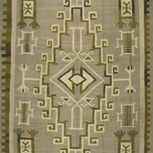 Flatweave rug with a central diamond and geometric figures in gray, olive, cream, and blue accents.