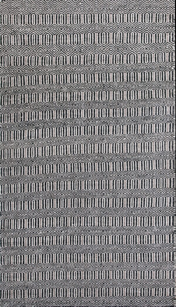 Dark and light geometric runner rug displaying repeating ovals and diamonds on a distressed wood plank floor.