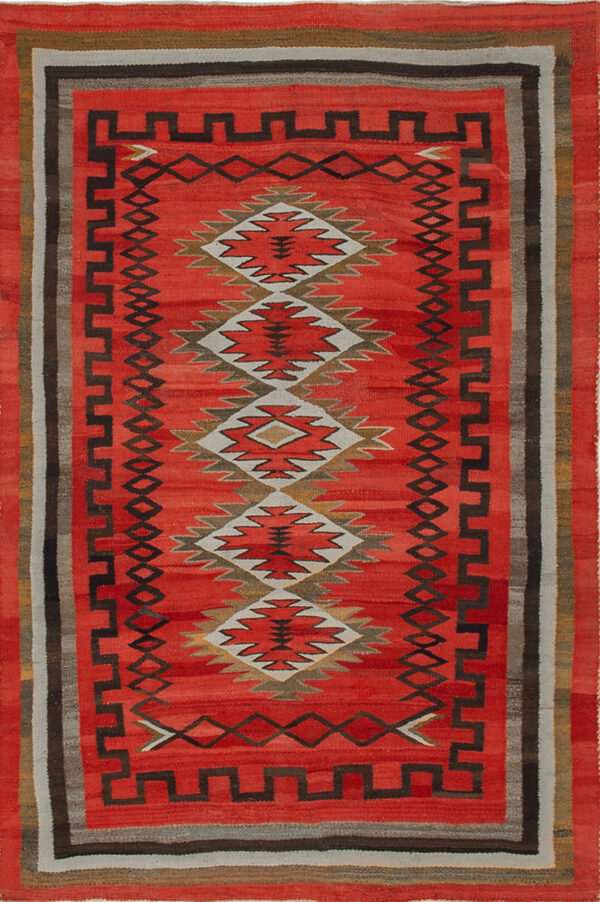 Antique wool coral / salmon pink flat weave rug