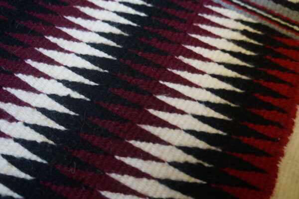 Antique allover geometric wool flat weave multicolor jewel tones 1930s square rug 4 Diagonal black, cream, and burgundy stripes form a sharp, geometric pattern on the low-pile square rug.