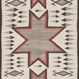Flat-woven geometric rug featuring gray, red, and brown stepped stars and symbolic corner motifs on white.
