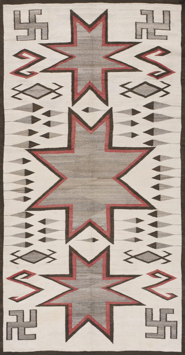 Flat-woven geometric rug featuring gray, red, and brown stepped stars and symbolic corner motifs on white.