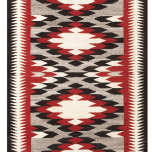 Black, red, gray, and white flatweave rug featuring a bold geometric diamond pattern.