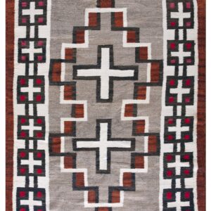 Flatweave rug with a heathered gray field, rust border, and geometric white, red, and dark brown patterns.