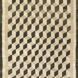 Flatweave rug displaying a geometric tumbling cube design in dark brown, tan, and off-white.