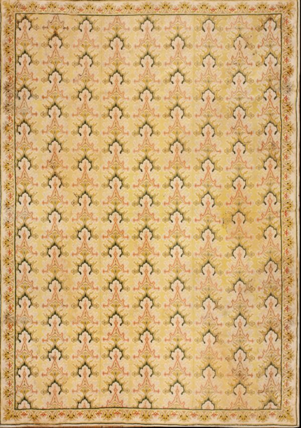 Intricate floral pattern on yellow background