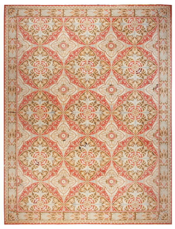 Ornate rug with repeating trellis, floral, and medallion motifs in red, brown, and cream colors.