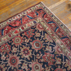 Colorful Persian rug with intricate patterns.