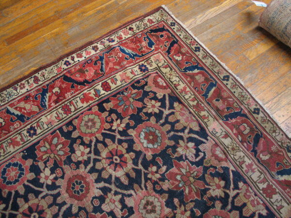 Colorful persian rug with intricate patterns.
