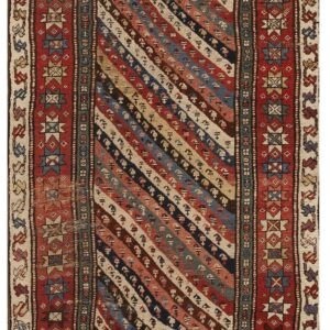 Red and cream geometric border surrounds a central field of multicolored diagonal stripes and animal motifs.