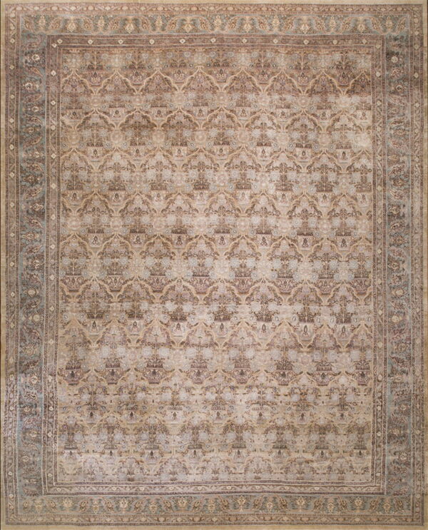Full view of a low-pile traditional rug with beige, brown, and gray-blue ornate medallion patterns.