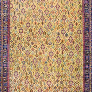 Colorful intricate patterned yellow rug