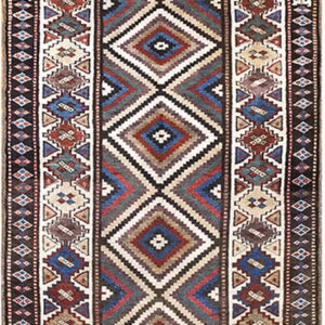 Multicolor runner rug featuring large stacked diamond motifs surrounded by detailed geometric border patterns.
