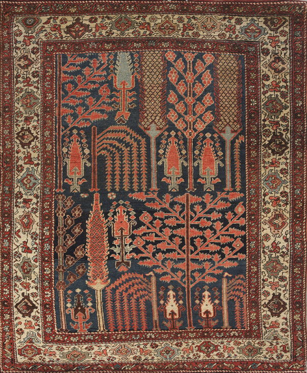 Textured rug featuring dark blue field with red geometric trees and a complex patterned beige border.