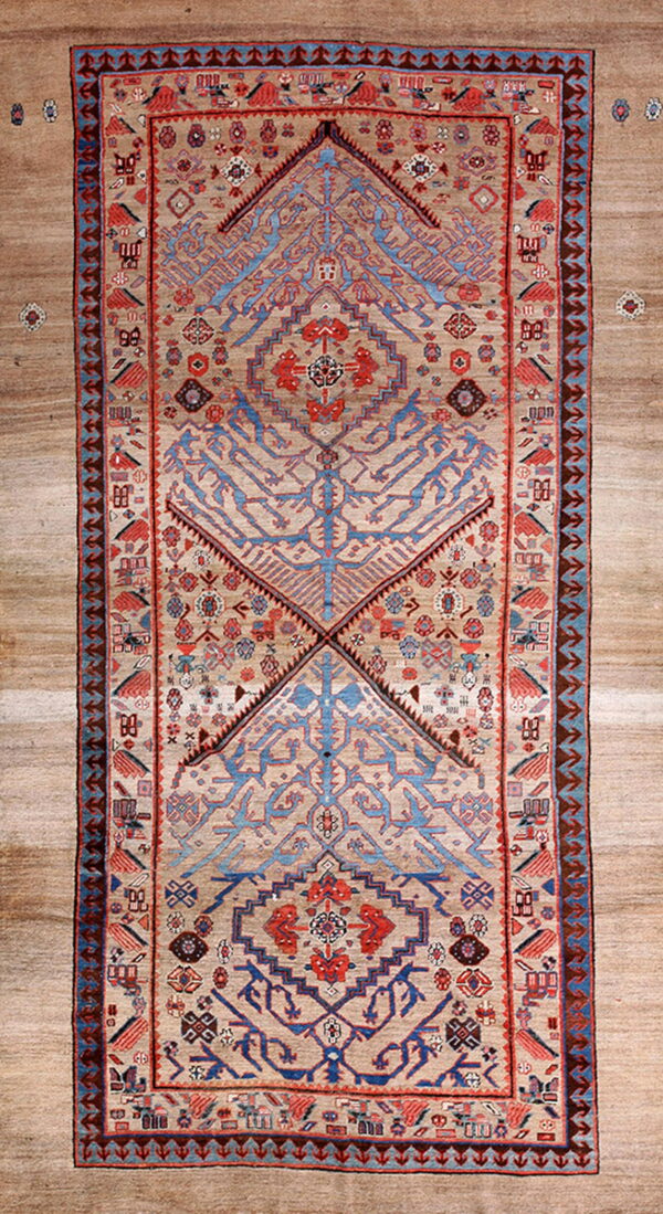 Rare collectable tribal camel color late 19th century antique nw persian serab rug 1 Beige runner rug with tribal blue and red geometric patterns centered on wide light brown flooring.