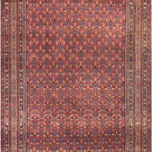 Full view of a dense red runner rug with blue repeating geometric motifs and striped borders.