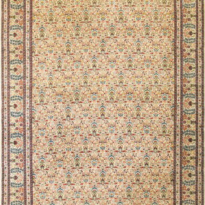 Cream rug featuring a dense multicolored all-over floral pattern and a wide, detailed maroon border.