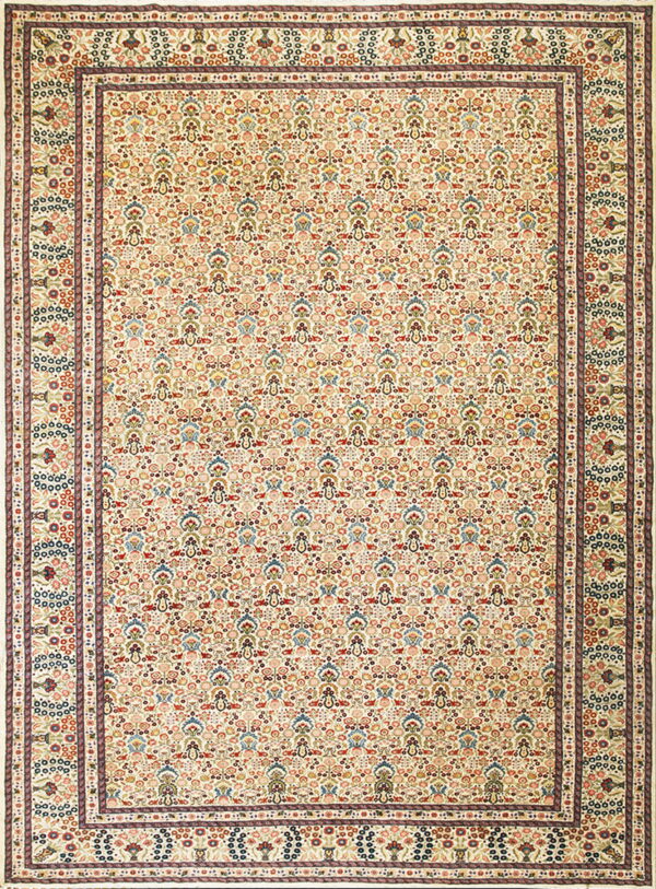 Cream rug featuring a dense multicolored all-over floral pattern and a wide, detailed maroon border.