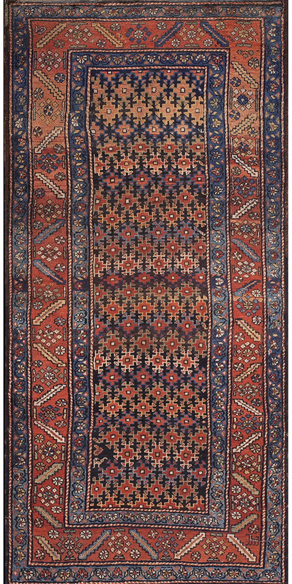 A geometric runner rug featuring a dark field of repeating crosses and a wide rust border.