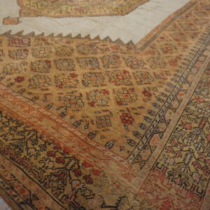 Intricate patterns on vintage wool rug.