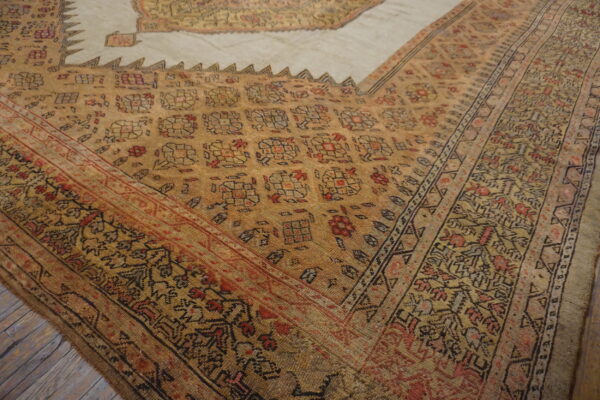 Intricate patterns on vintage wool rug.