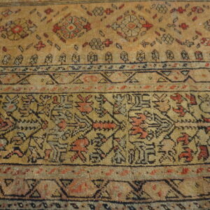 Intricate patterns on vintage wool rug