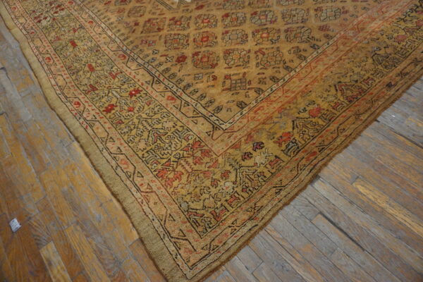 Intricate vintage rug with warm tones
