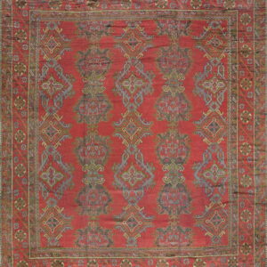 Vibrant red antique Turkish rug design.