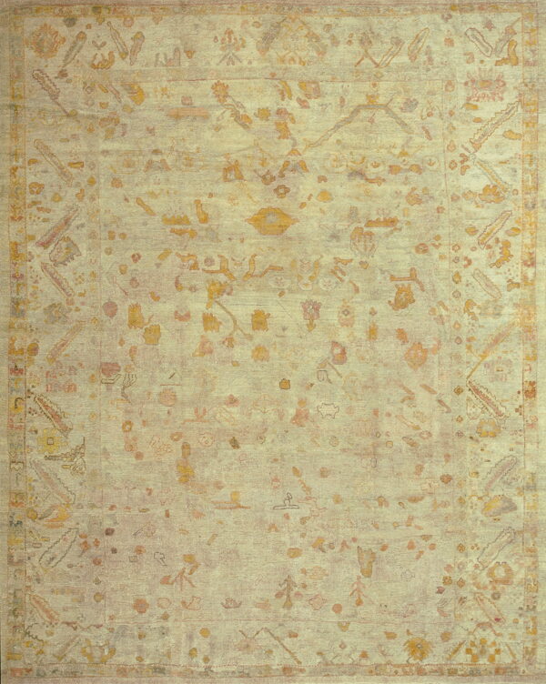 Faded ivory rug with intricate patterns.