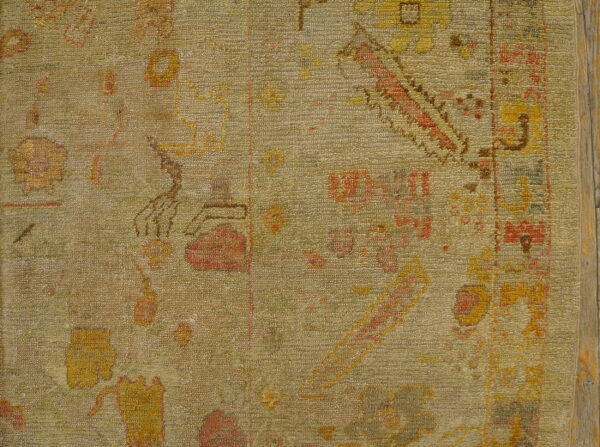 Faded floral patterns on textured rug