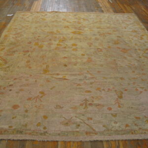 Faded floral design on ivory background