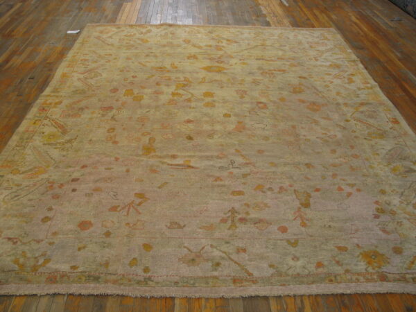 Faded floral design on ivory background