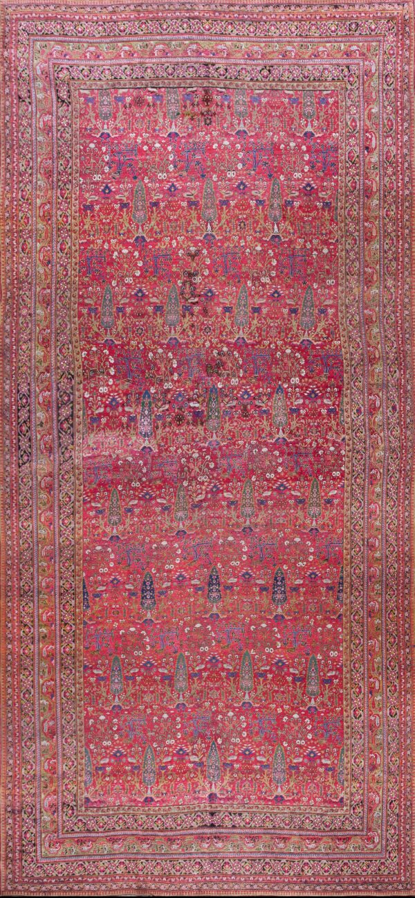 Vibrant persian rug with intricate patterns.